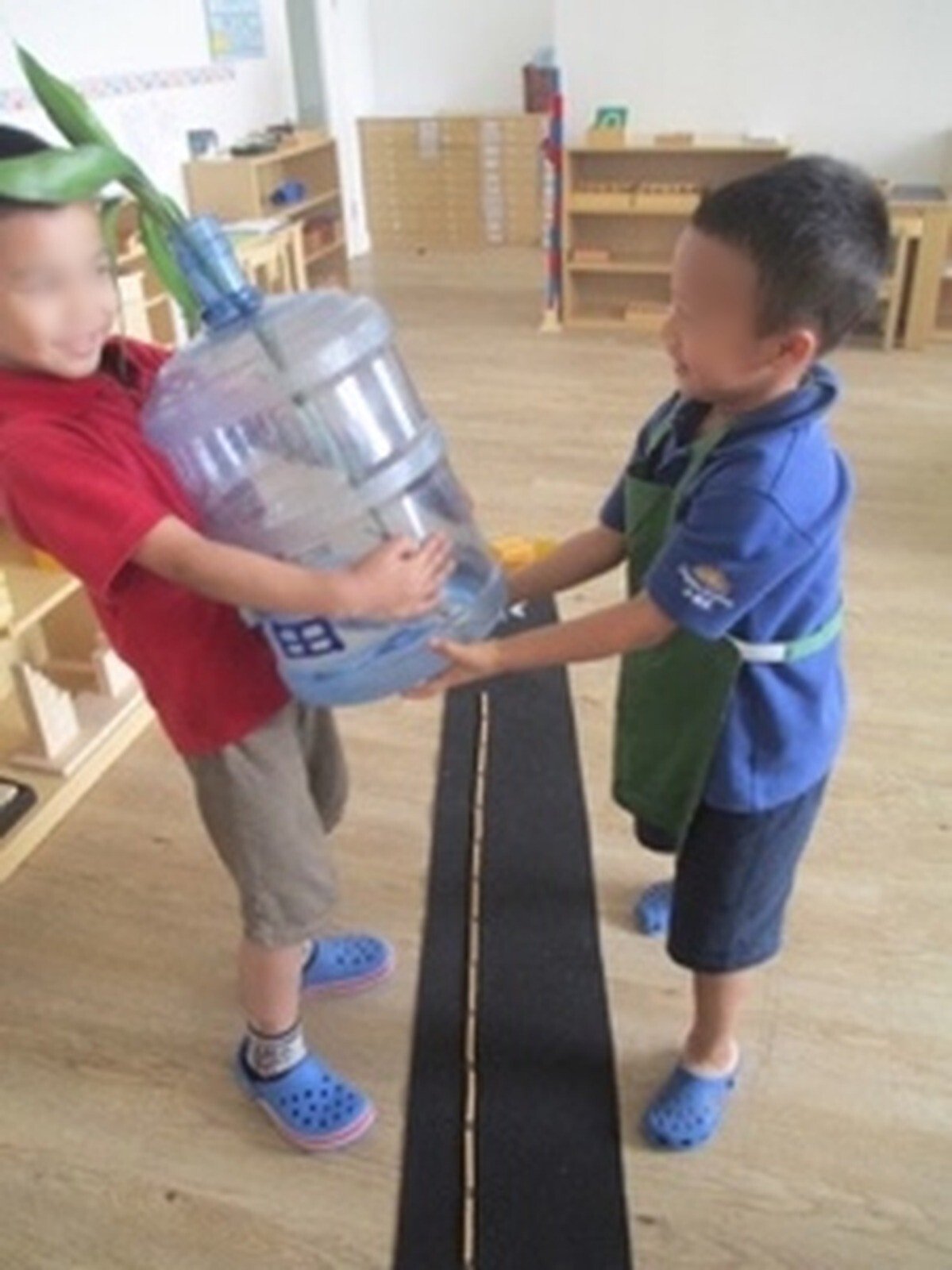 Children with a water bottle