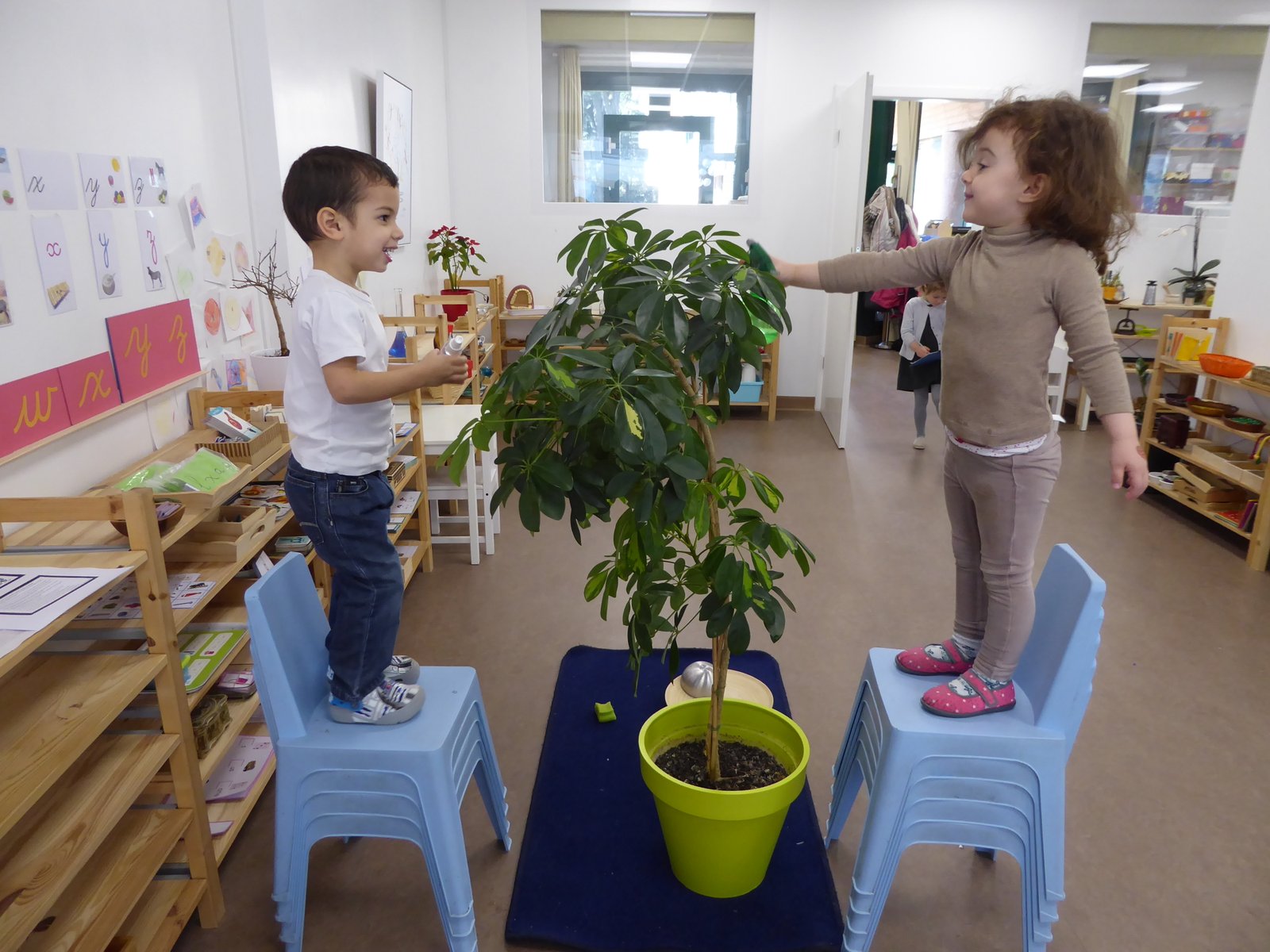 Adult and child at a table
