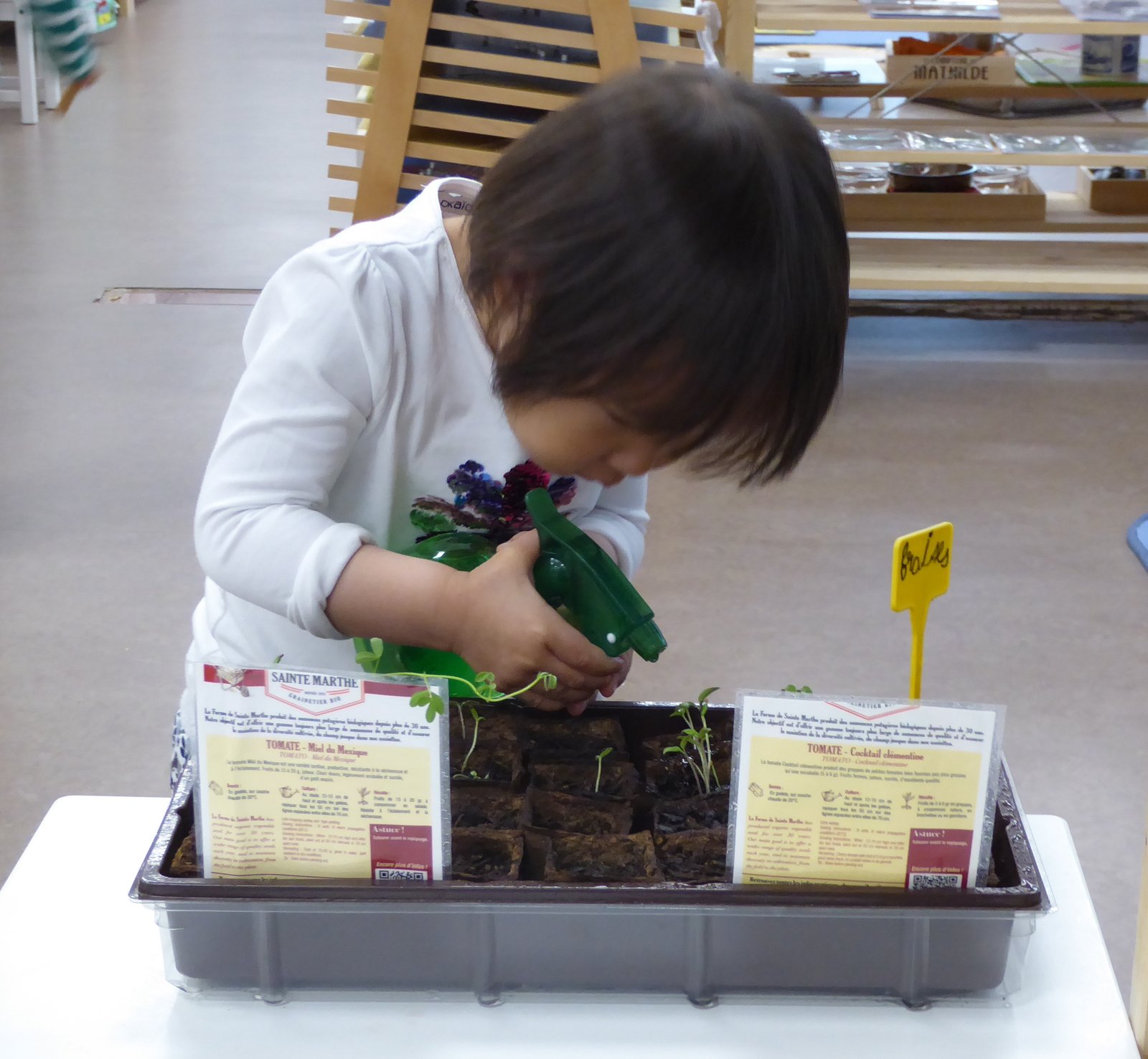Child using a dressing frame