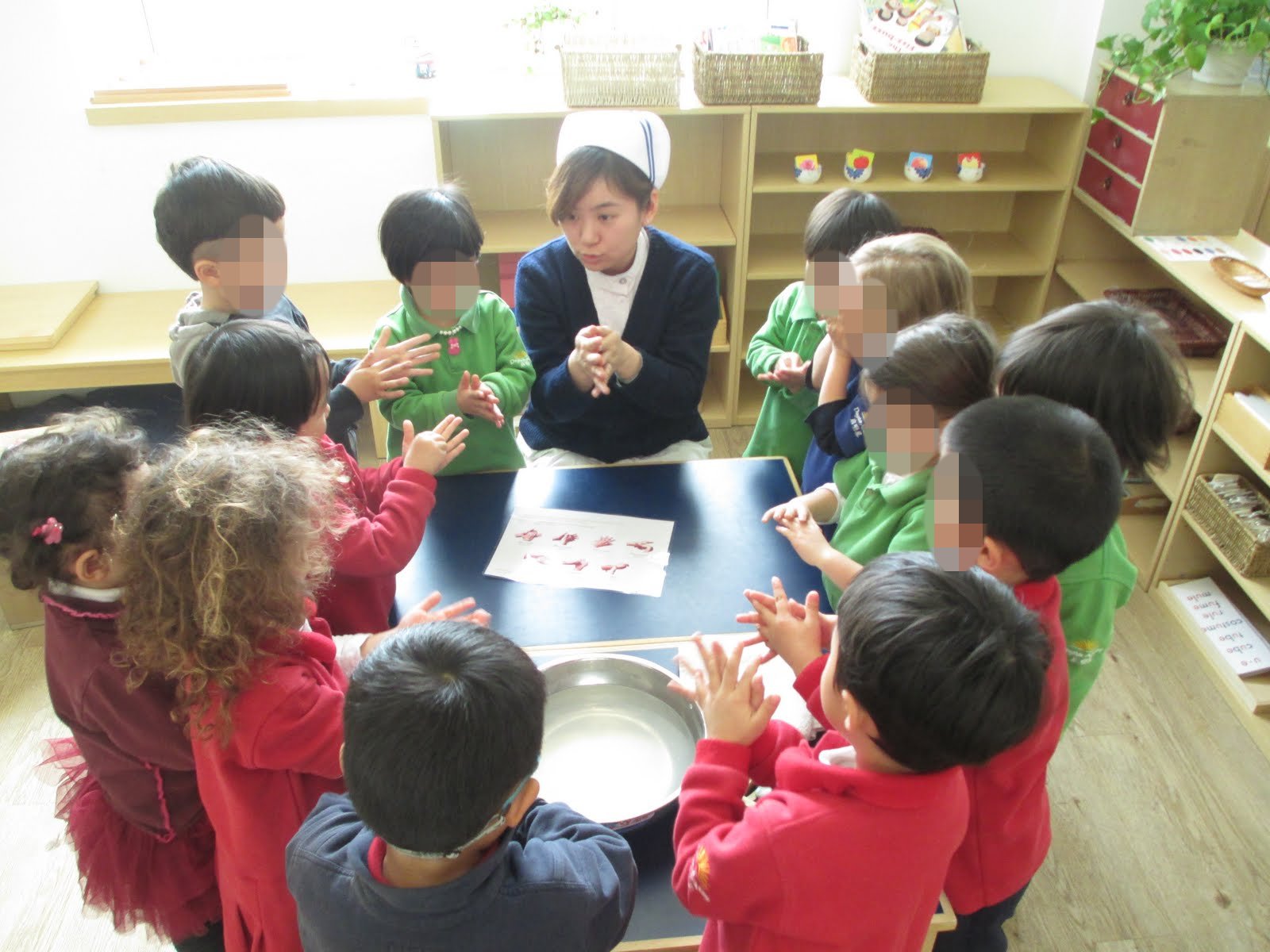 Children washing hands together