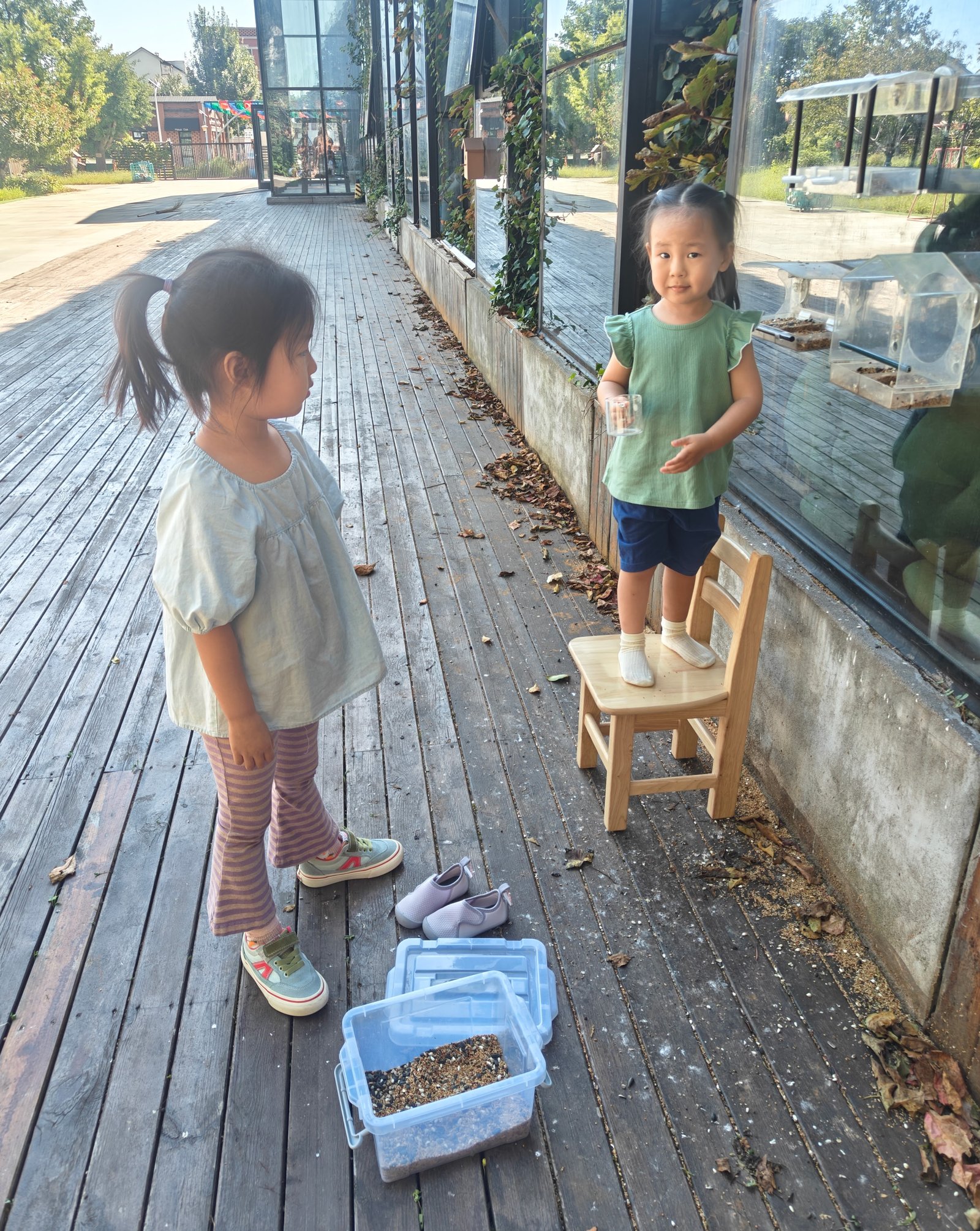 Children holding a table top