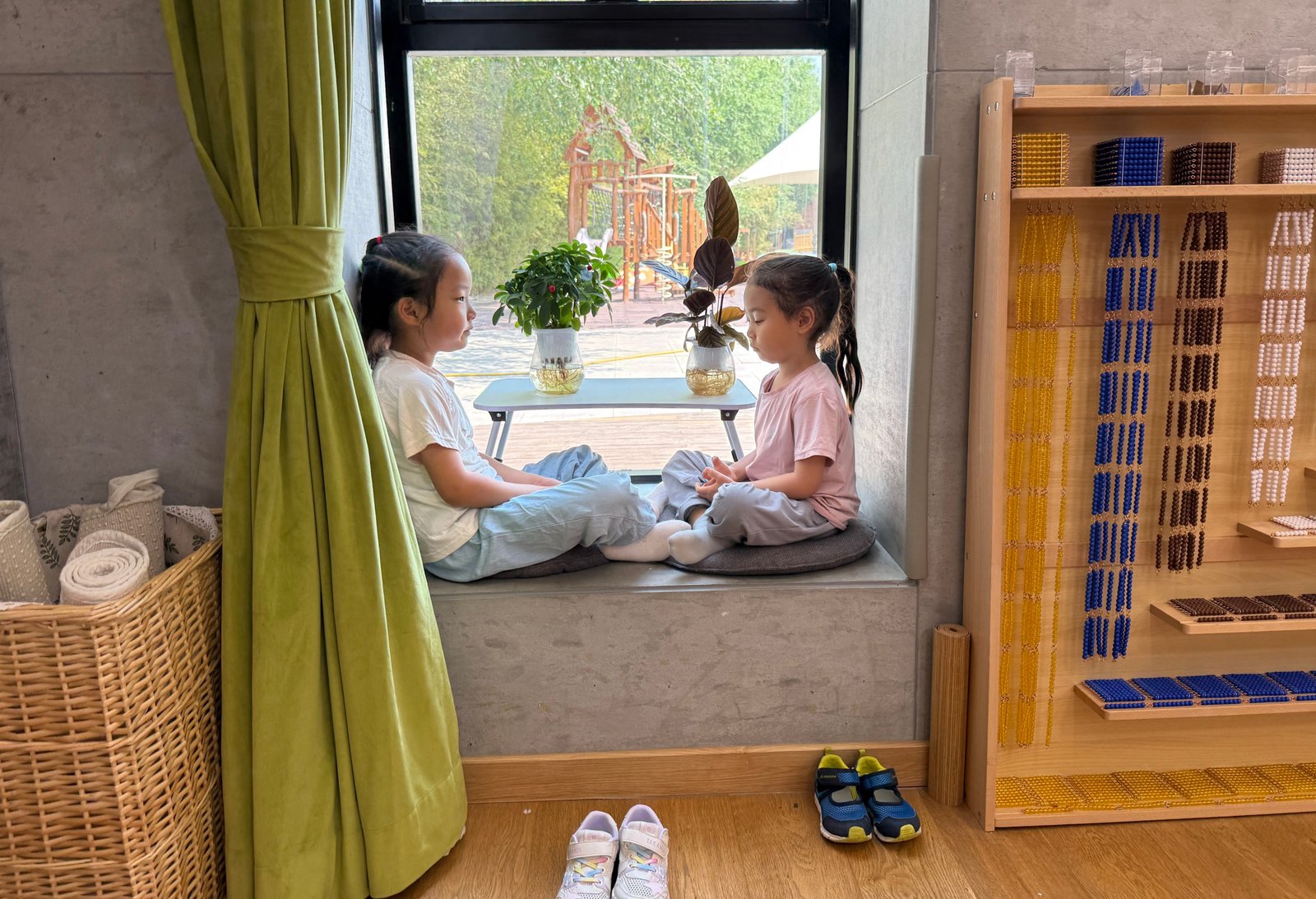 Child washing a glass door